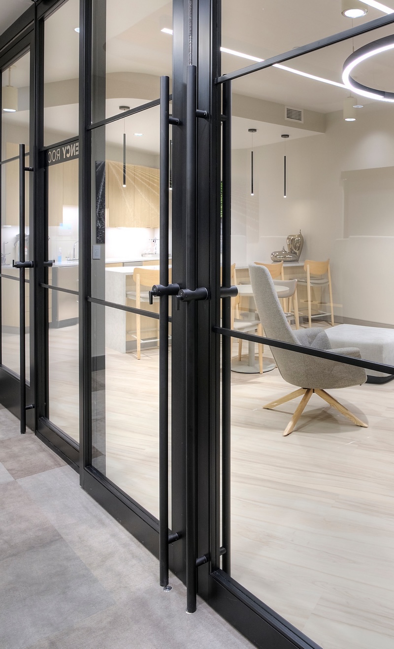 72 inch locking ladder handle on a glass door